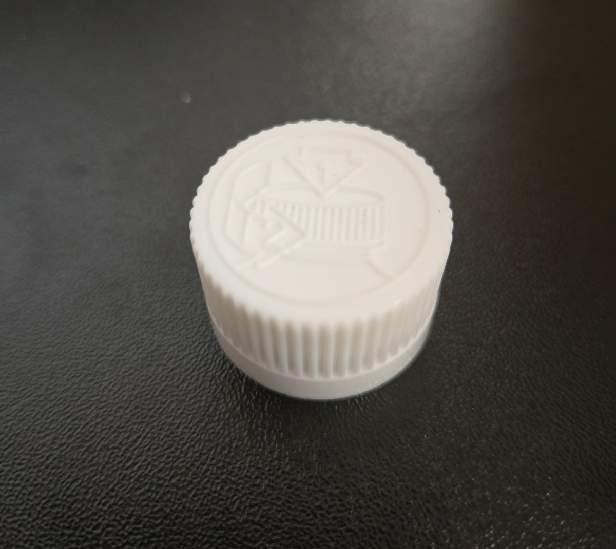 20mm 20-400 White Child Resistant Cap (Pictorial) w/F-217 Foam Liner (5000 Qty)