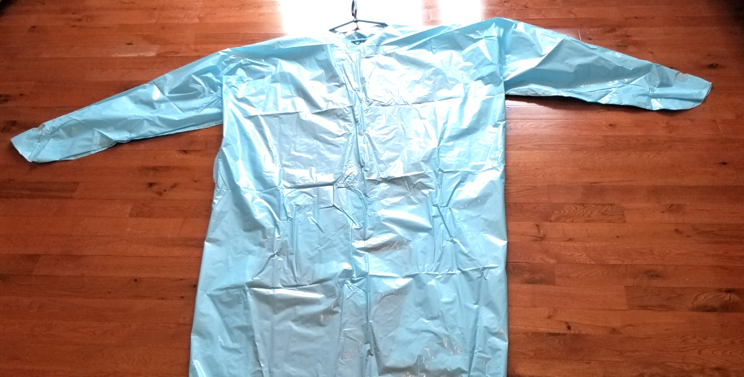 Set of 32 Disposable Blue Plastic Gowns Thumb Hook, over Head, Open Back. L/XL