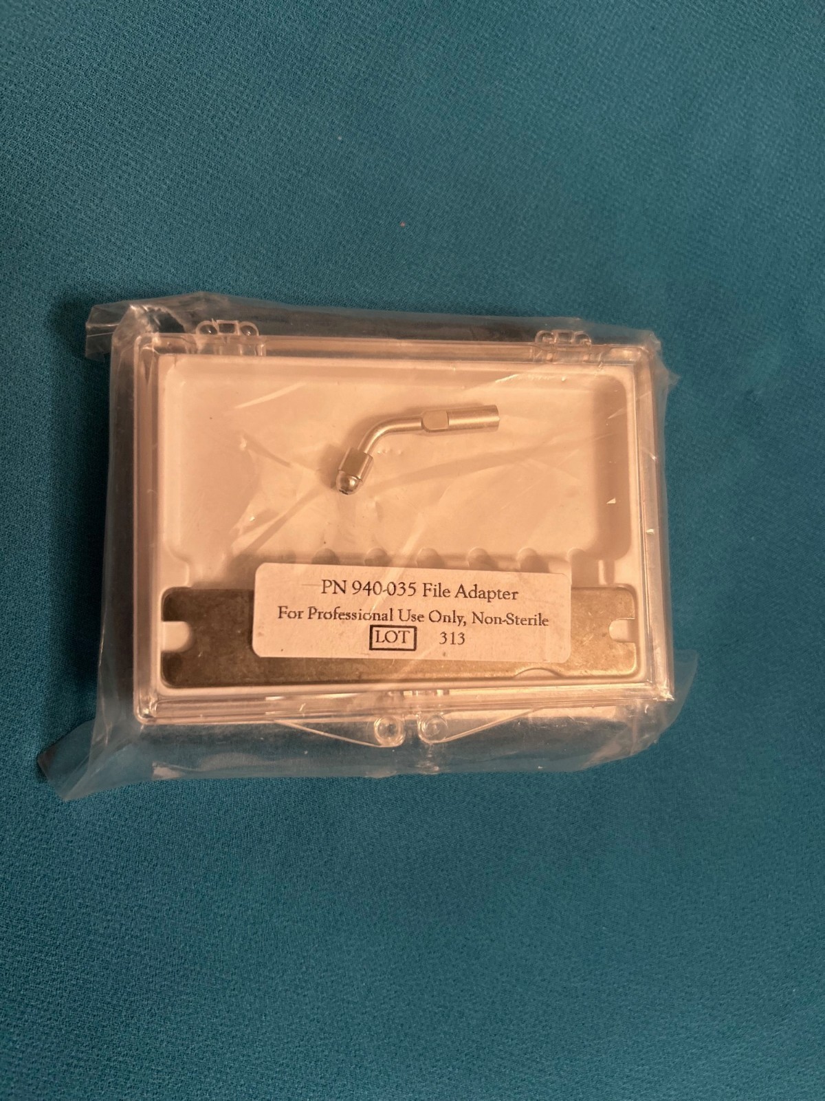 K File Adaptor for irrigation and instrument retrieval. Made by Spartan USA.