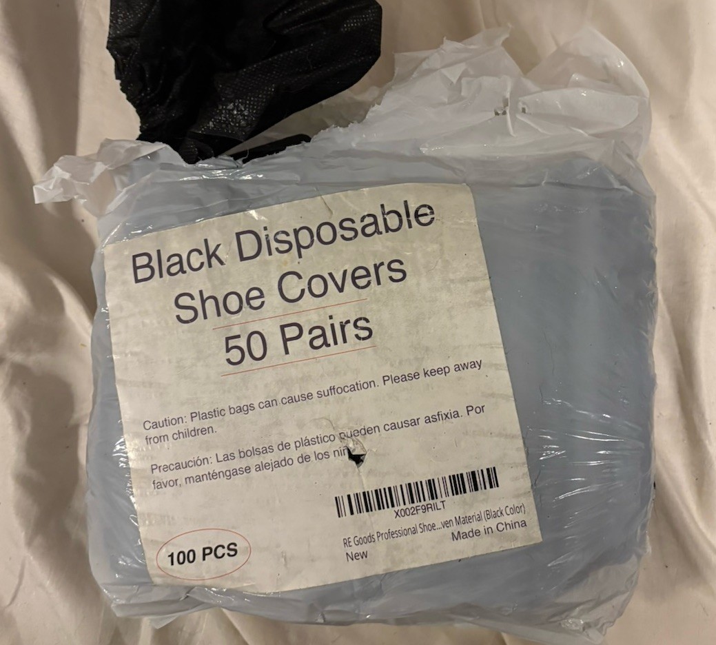 Approximately 50 Pair Of Black Disposable Shoe Covers Unbranded SEE DESCRIPTION