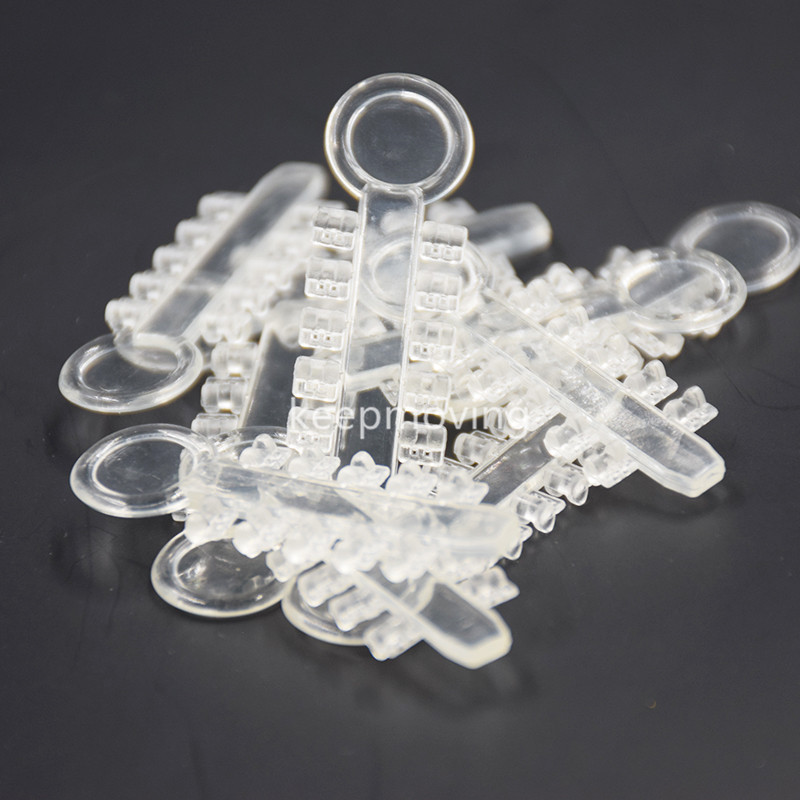 Dental Orthodontic Elastomeric Elastics Rotation Wedges Clear 200 Pcs/bag