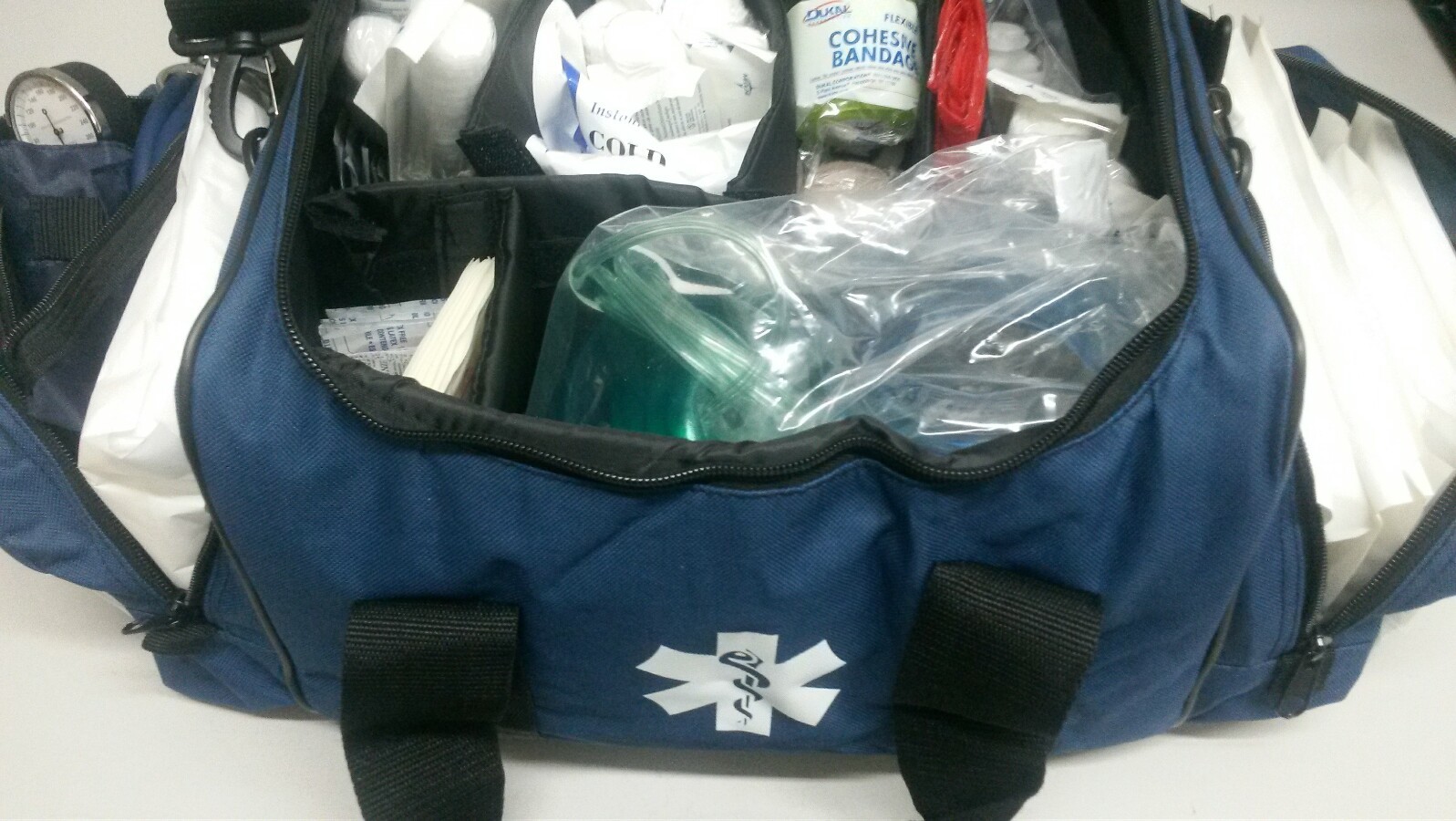 TRAUMA KIT FULLY STOCKED ALS. NEON ORANGE ONLY.