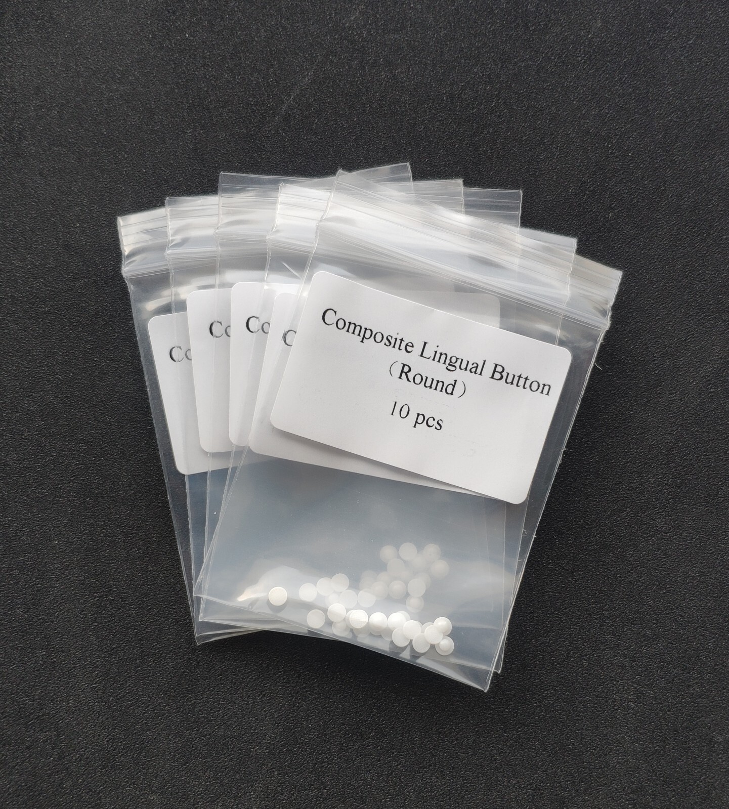 100Pcs Dental Orthodontic Ceramic Lingual Buttons Bondable Round Mesh Base