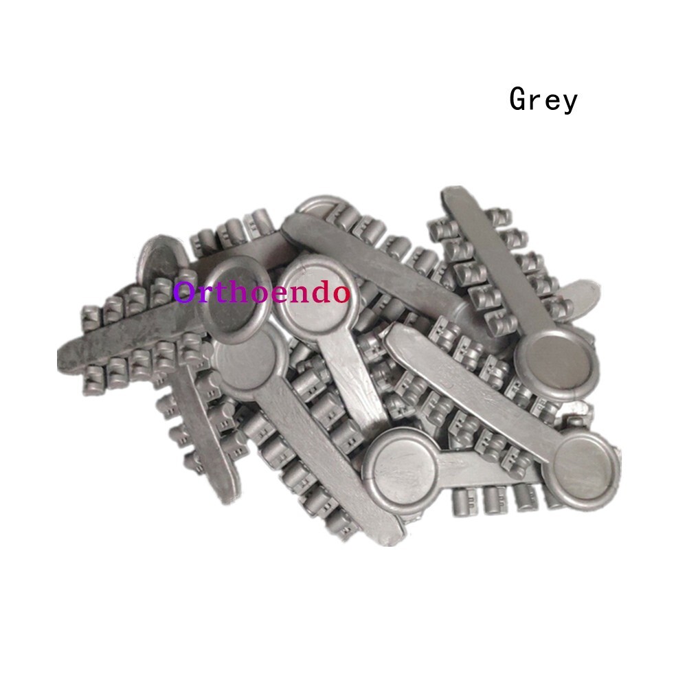 100Pcs Rotation Wedge High Elastic Rubber Clear Gray 10Pcs/Stick Orthodontic