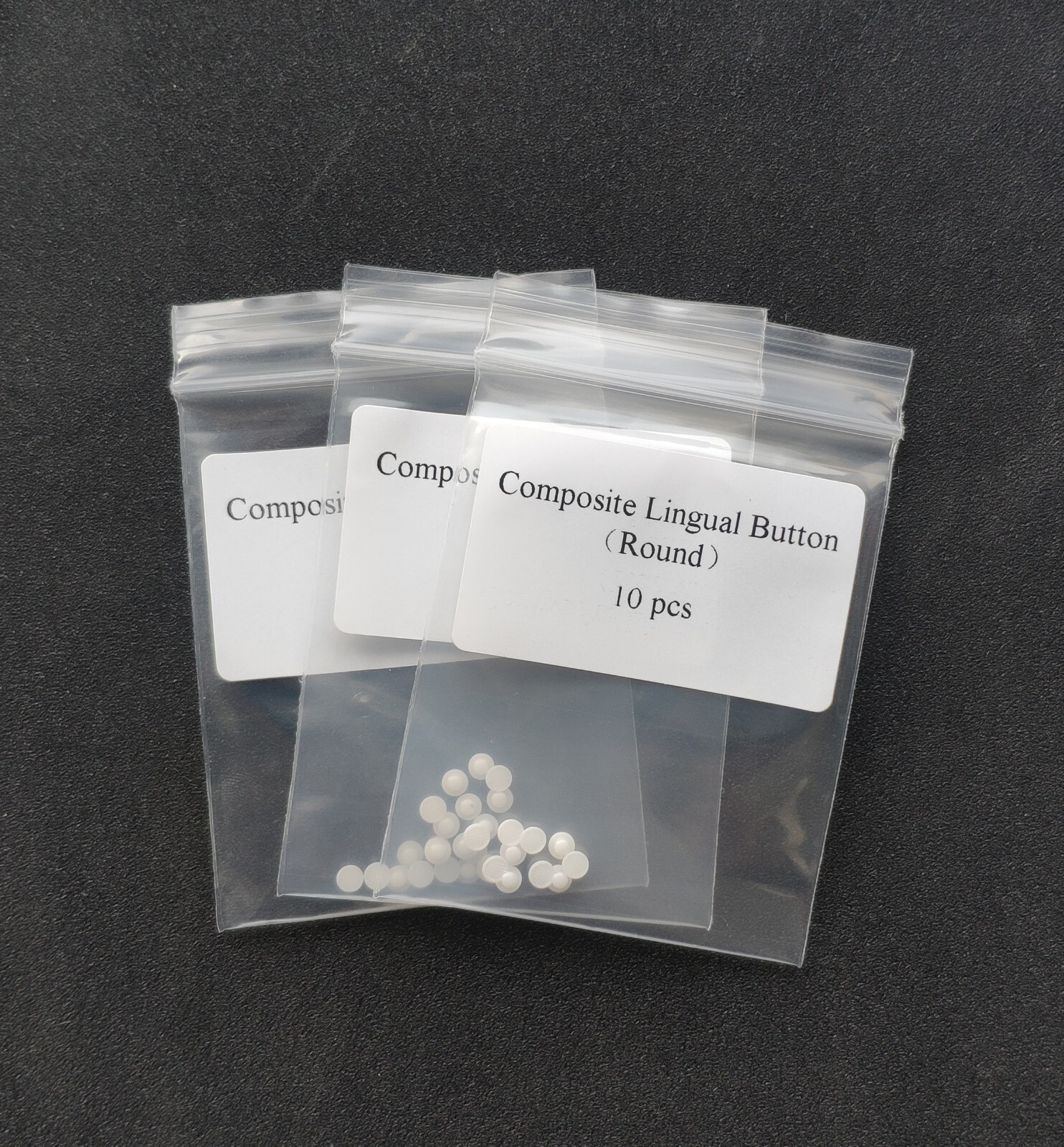 100Pcs Dental Orthodontic Ceramic Lingual Buttons Bondable Round Mesh Base