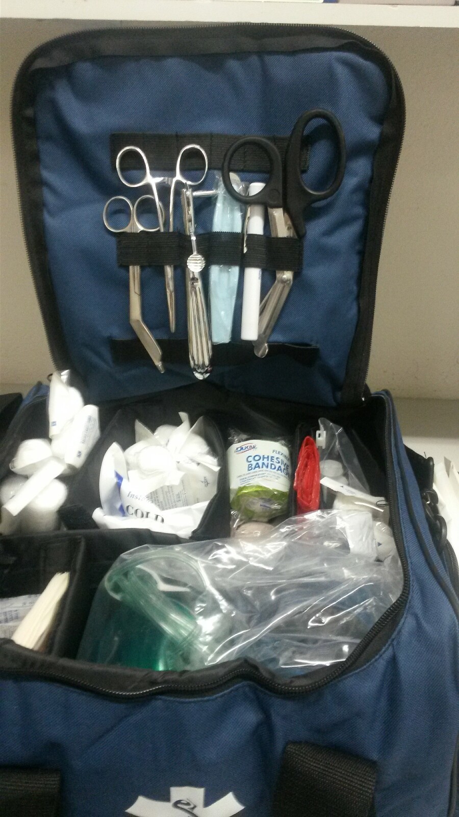 TRAUMA KIT FULLY STOCKED ALS. NEON ORANGE ONLY.