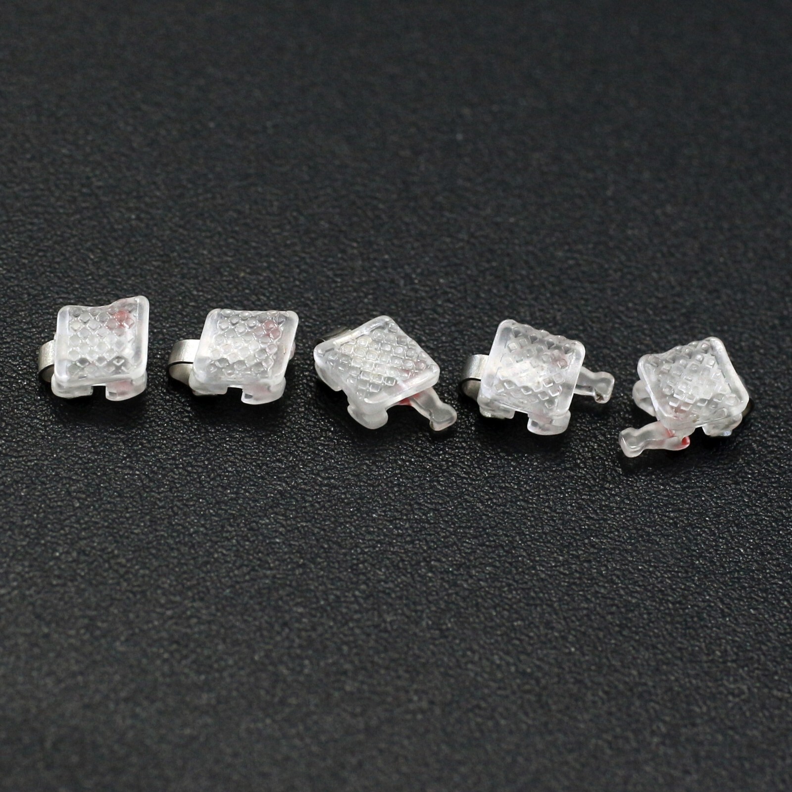 Dental Orthodontic Ceramic Brackets Self Ligating Braces Clear Sapphire Roth MBT