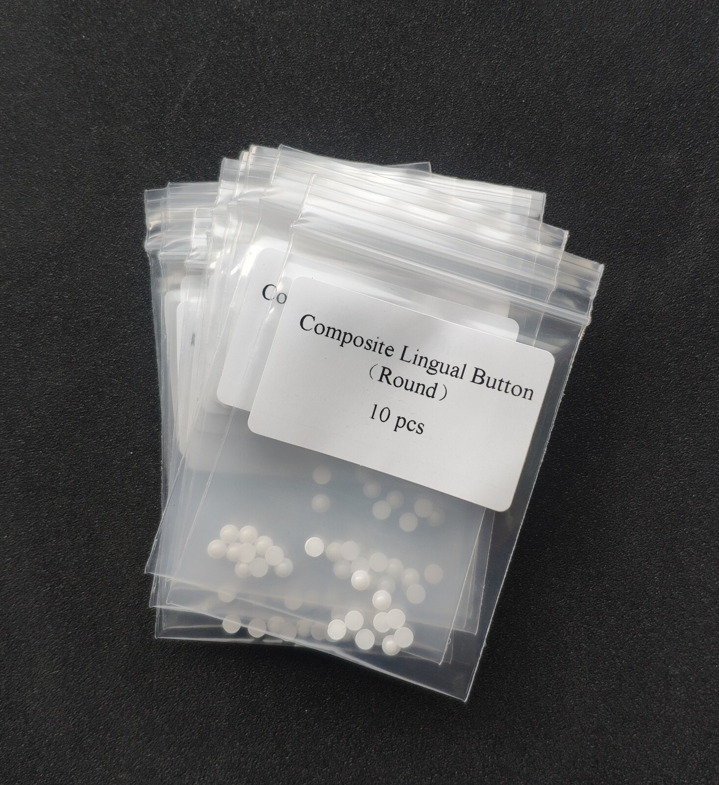 100Pcs Dental Orthodontic Ceramic Lingual Buttons Bondable Round Mesh Base